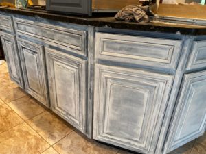 Primer on kitchen cabinets before painting