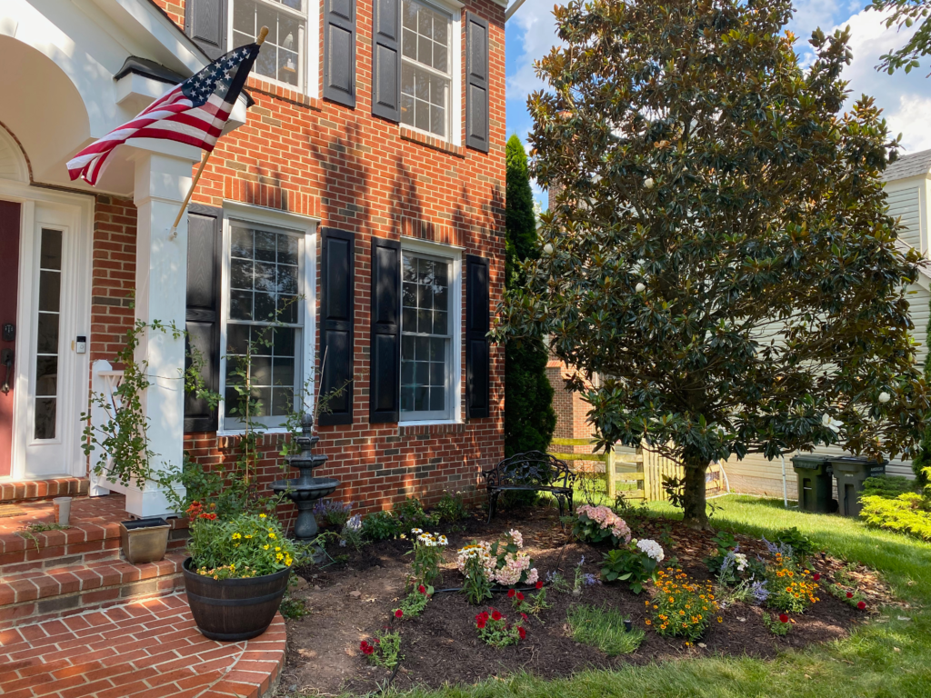 Front flower bed with hydrangeas, Russian sage and roses